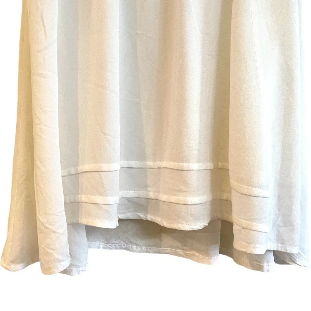 RUE 21, WHITE EMPIRE DRESS WITH BLACK EMBROIDERY. HI-LOW SKIRT. SIZE S